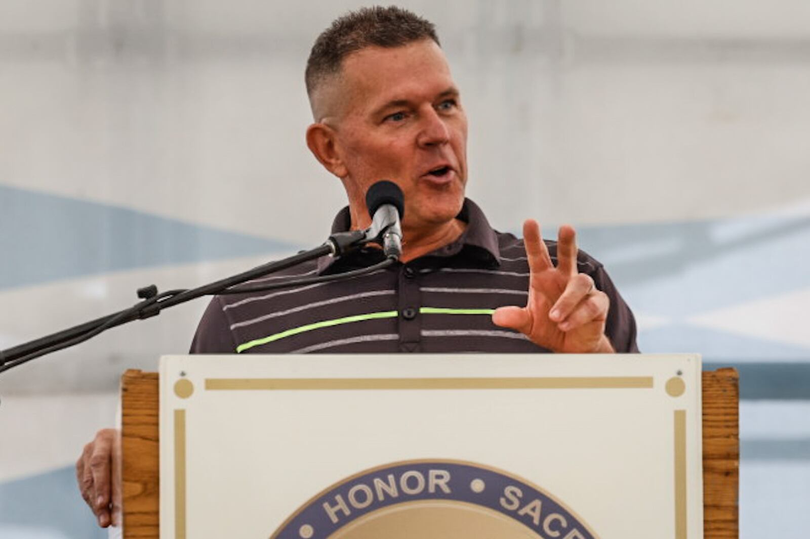 Former Clearcreek Township Police officer Eric Ney speaks about the day he was shot in the head while on duty. JIM NOELKER/STAFF
