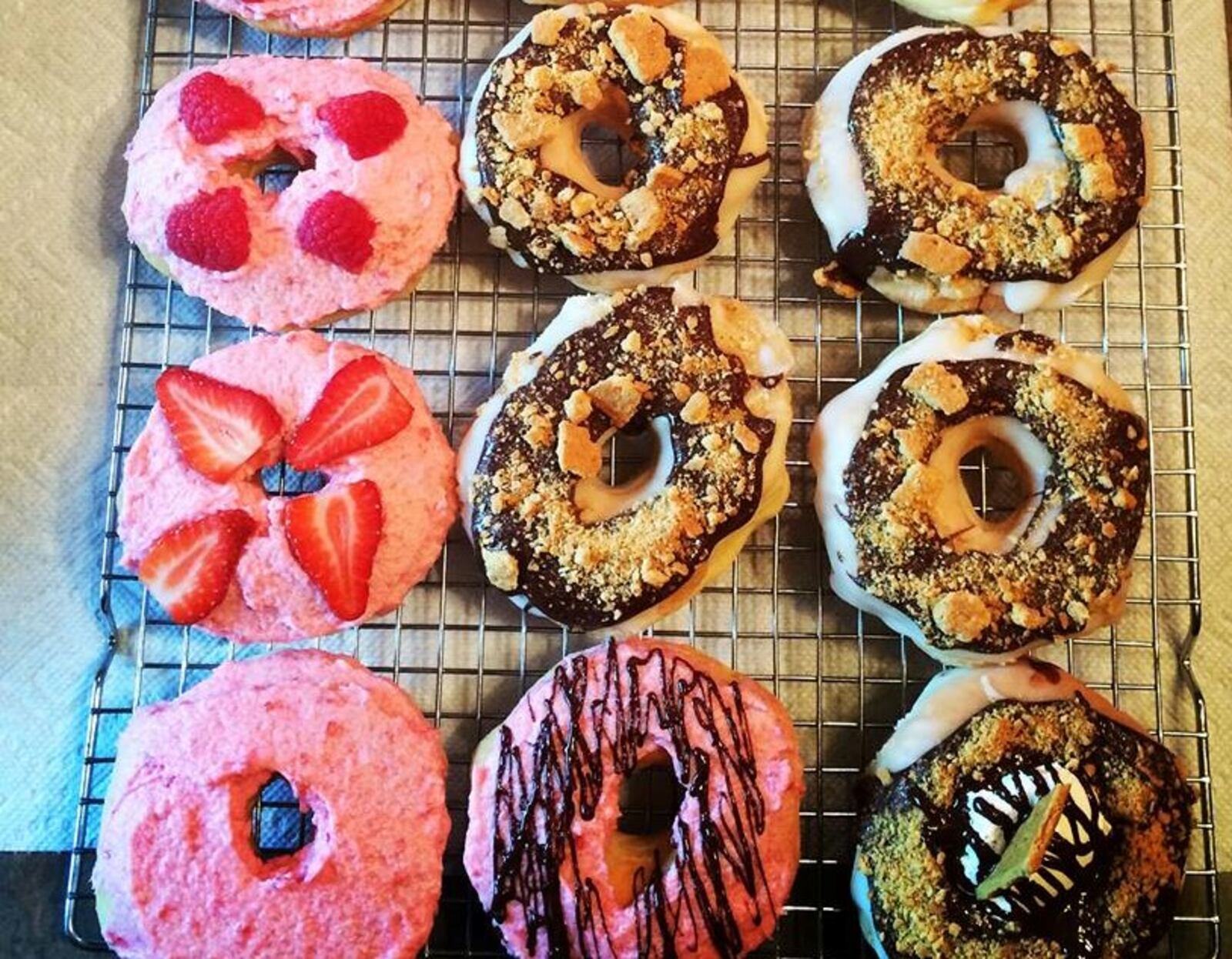 Ryan and Danielle Tripp, who operate Bear Creek Donuts in Miamisburg, are in the process of purchasing the Donut Haus in Springboro from founder Mike Hemmert. Photo from Bear Creek Donuts Facebook page
