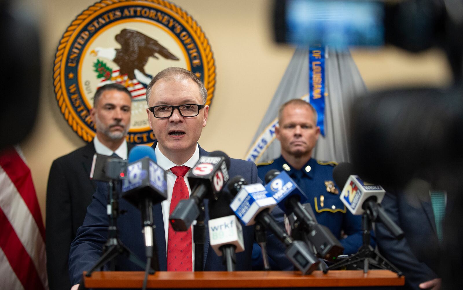 Federal Bureau of Investigation Special Agent in Charge Jonathan Tapp speaks during a press conference announcing the indictment of current and former police officers on fraud and conspiracy charges, Wednesday, July 16, 2025, at the Lafayette Federal Courthouse in Lafayette, La. (Brad Bowie/The Times-Picayune/The New Orleans Advocate via AP)