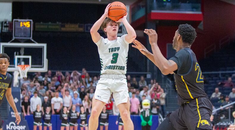 Troy Christian's Parker Penrod shoots for two points during the first half of Tuesday night's 58-32 victory over Riverview East in a Division IV district final at UD Arena. CONTRIBUTED/Jeff Gilbert