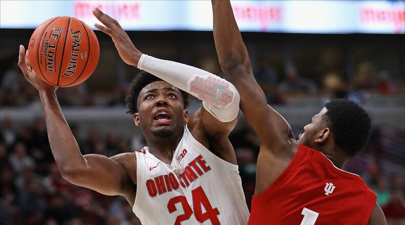 CHICAGO, ILLINOIS - MARCH 14: Andre Wesson #24 of the Ohio State Buckeyes tries to get off a shot against Aljami Durham #1 of the Indiana Hoosiers at the United Center on March 14, 2019 in Chicago, Illinois. Ohio State defeated Indiana 79-75. (Photo by Jonathan Daniel/Getty Images)