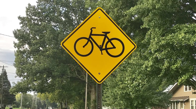 Several residents who live along Riverside Drive in Troy say they oppose a city plan to place a bike path in the right of way along their properties. STEVE BAKER/STAFF