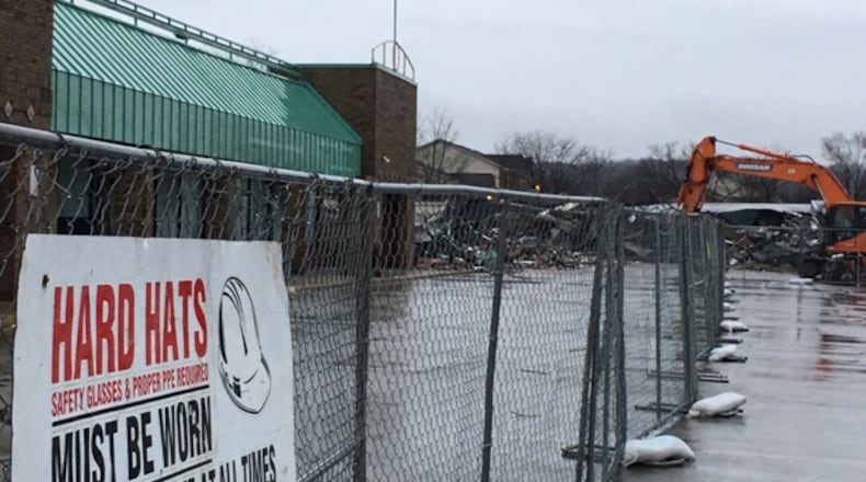 Demolition work has started at Alex Bell Plaza at 2917 W. Alex-Bell Road. The site in Moraine is owned by Kroger. NICK BLIZZARD/STAFF