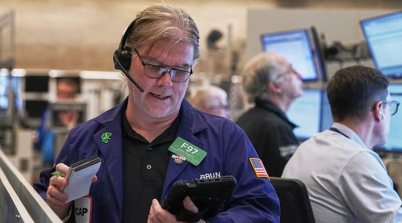Options trader Brian Garvey works on the floor of the New York Stock Exchange, Thursday, Nov. 6, 2025. (AP Photo/Richard Drew)