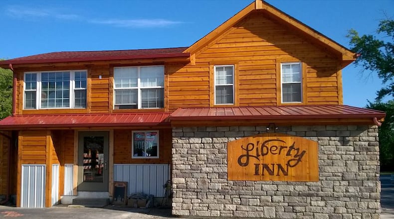 Liberty Inn, at 7163 Princeton Road in Liberty Twp., now sports a brick-and-wood facade, giving the business a lodgelike feel, customers say. Liberty Inn had, for many years, sported a blue paint job with the words “Liberty Inn” painted in white letters above a string of white stars on a red background. CONTRIBUTED