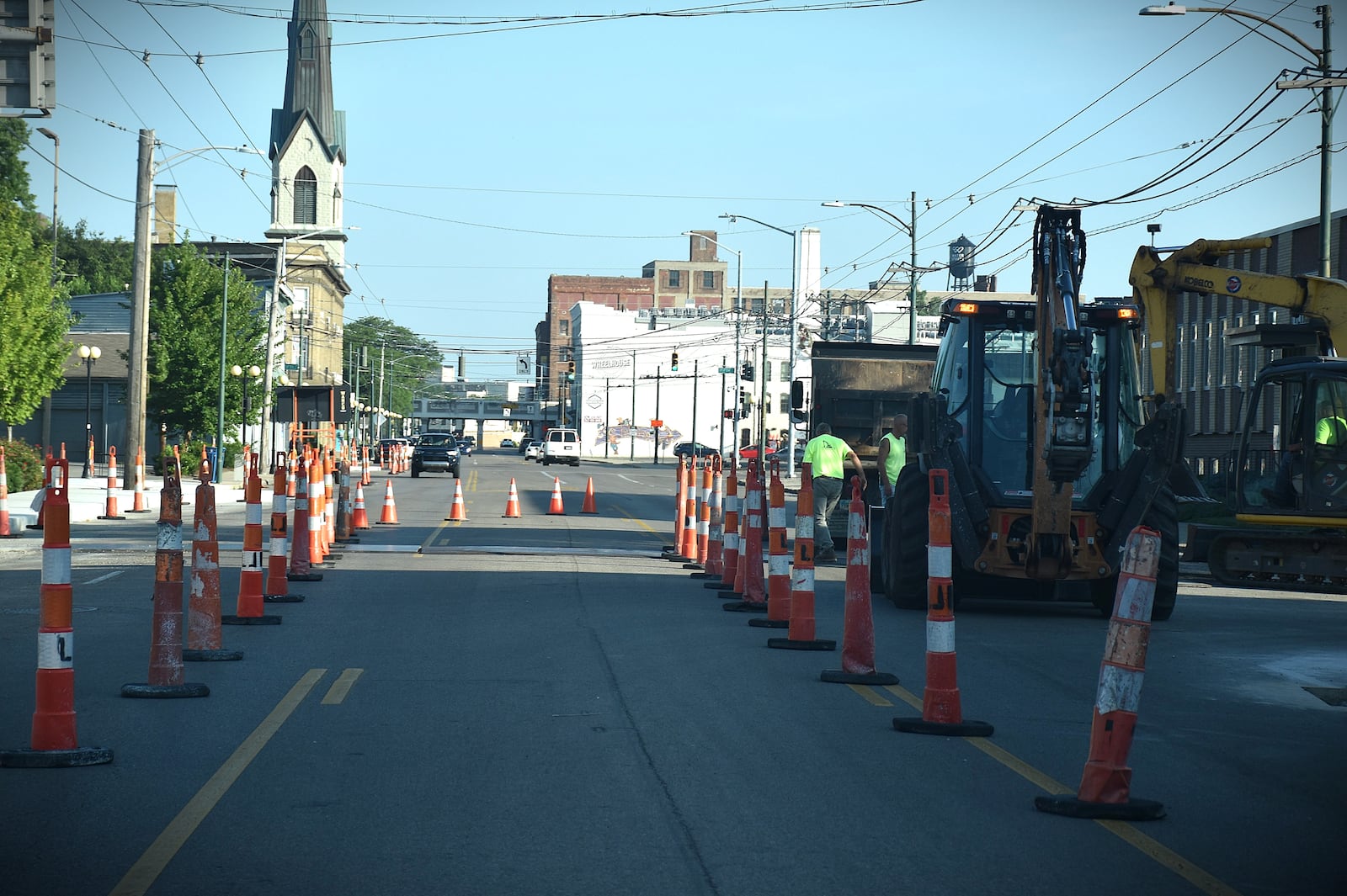 Construction crews worked on Wayne Avenue near the Oregon District on July 23, 2025. CORNELIUS FROLIK / STAFF