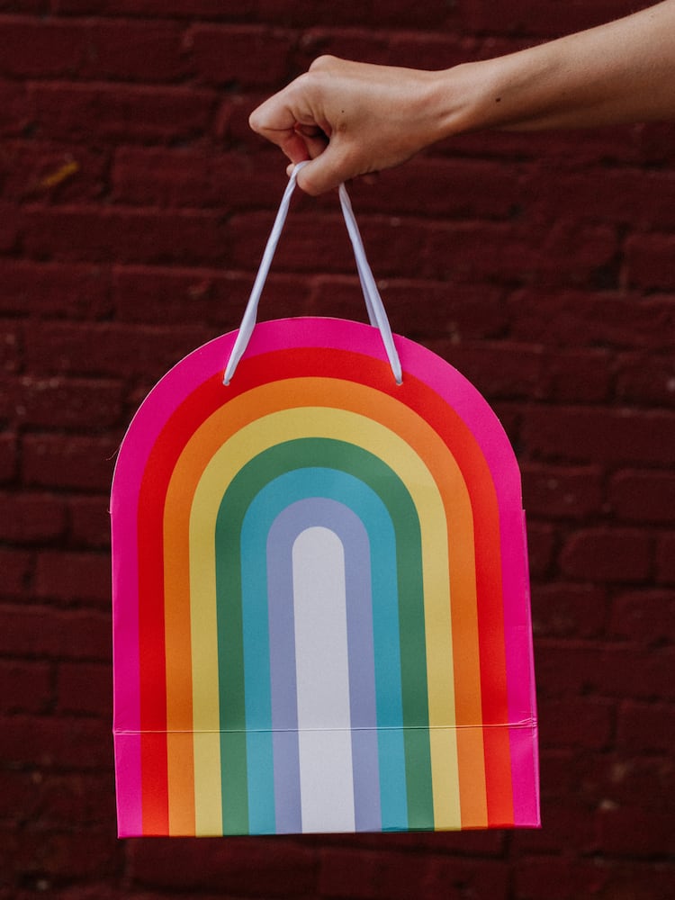 A rainbow shopping bag during the WorldPride parade route in Washington on Saturday, June 7, 2025. (Caroline Gutman/The New York Times)