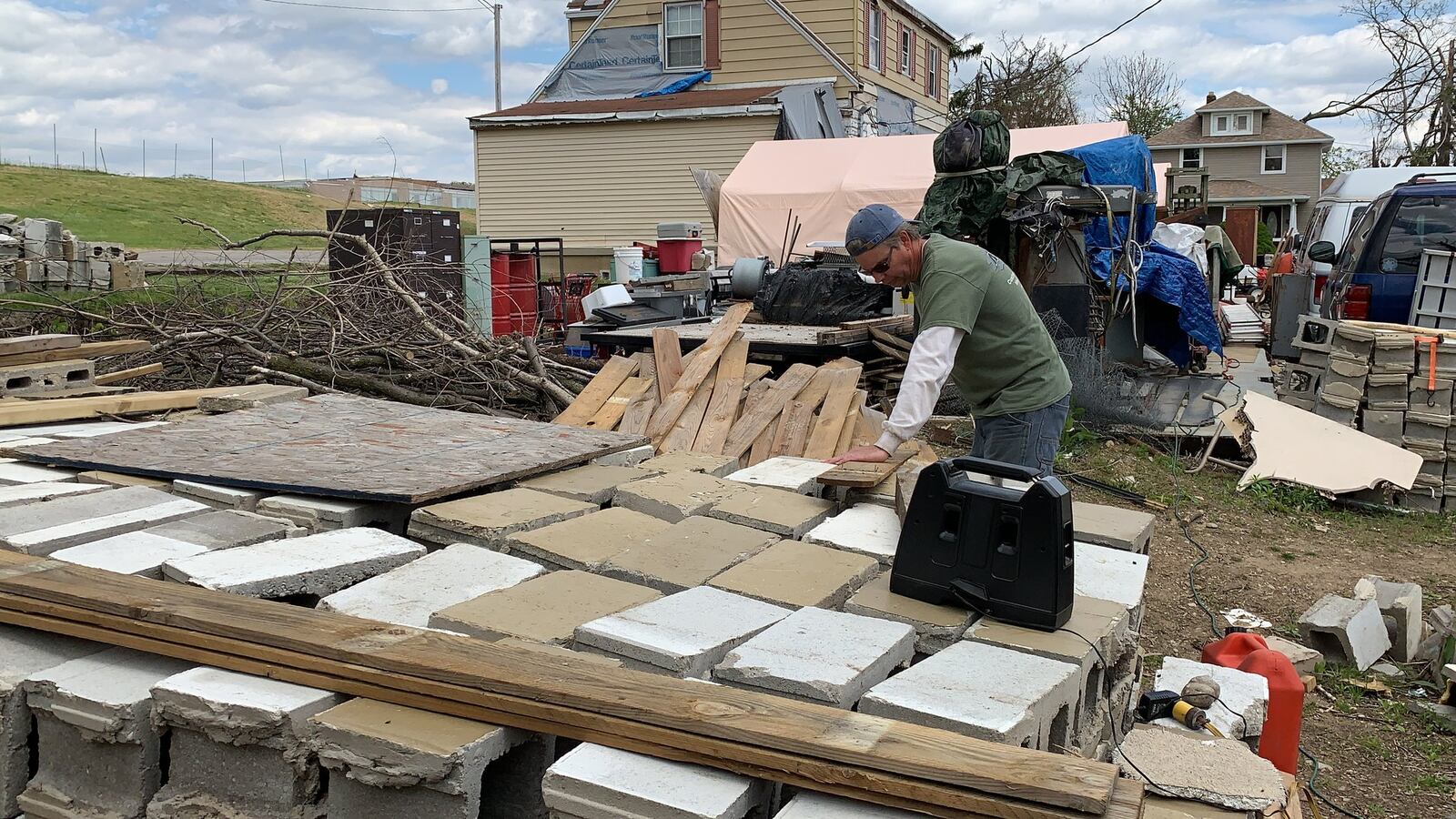 Lee Combs is rebuilding the fence around his still-damaged house along Wagner Ford Road because people still keep trying to steal the equipment in his yard that used to be housed in an outbuilding destroyed by the Memorial Day 2019 tornadoes.