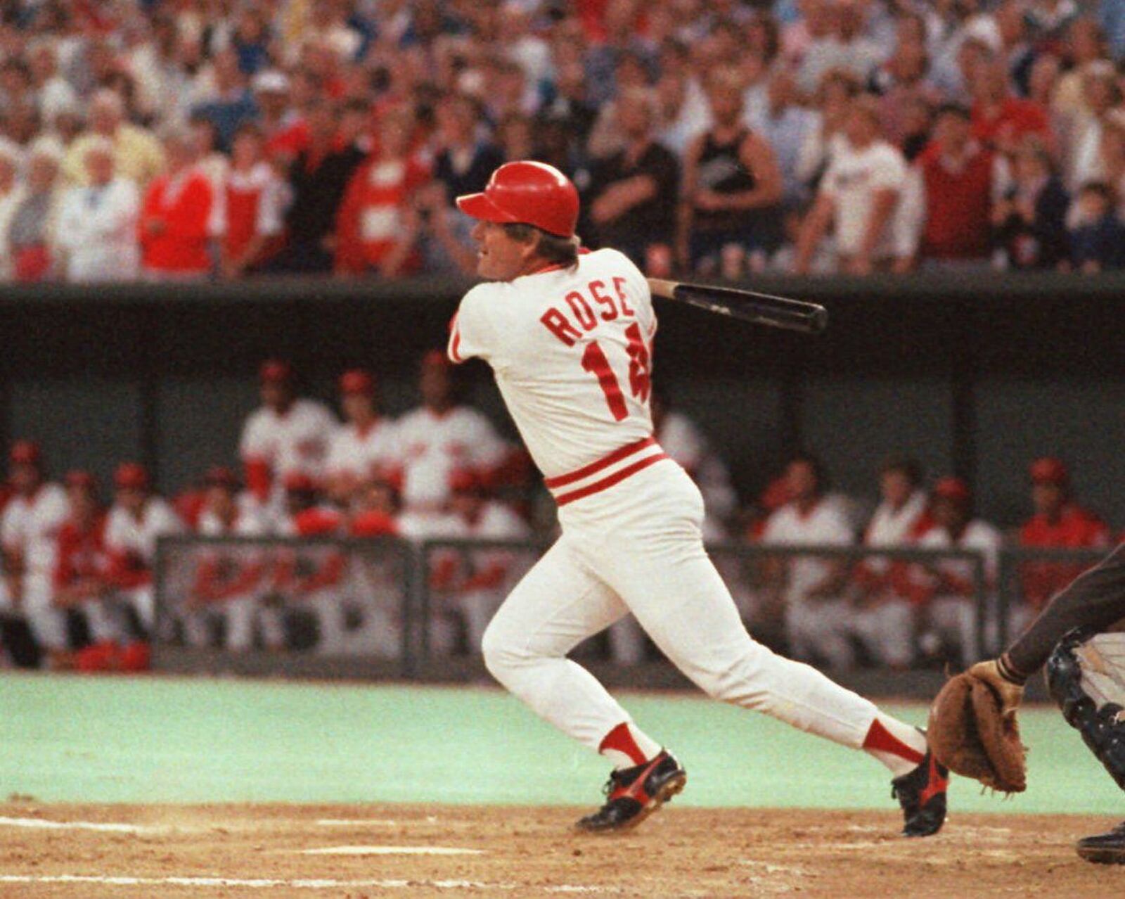 Cincinnati Reds Pete Rose hits a line drive, Sept.11,1985, in Cincinnati to break Ty Cobb's all-time hit record.