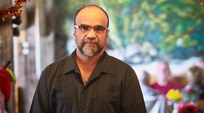 Reuben Pelayo, owner of El Somberero in Troy, is known for his giving to the community at Thanksgiving and all year round. JIM WITMER / STAFF