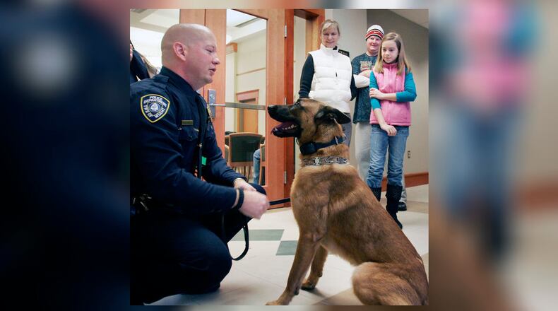 Douglas Hesler was a handler for Miami Twp. Police Department’s K-9, Coron, for several years. FILE