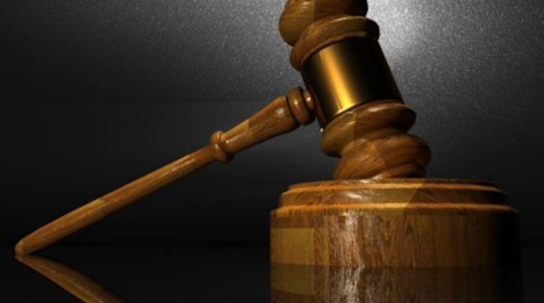 West Carrollton postal worker Laticha Schroyer pleaded guilty to a misdemeanor federal crime as federal prosecutors dismissed three felony counts.