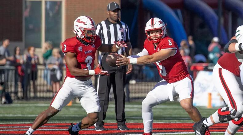 Miami's Brett Gabbert (5) looks to hand the ball off to running back Keyon Mozee (3) against Ohio earlier this season. Miami Athletics photo