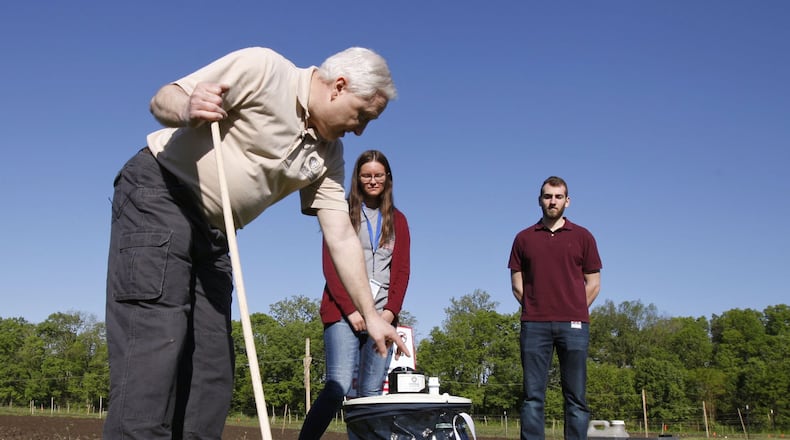 Public Health - Dayton & Montgomery County hosted a live demonstration of its mosquito surveillance program on Tuesday at the Wegerzyn MetroPark. Tom Hut, left, bureau supervisor of special services, and summer interns Caitlin Molina and Paul LaGasse talked about the types of mosquitoes that are trapped and demonstrated the devices and bait scents used to catch them. Hut also demonstrated a sprayer used in selected areas to reduce the mosquito population. TY GREENLEES / STAFF