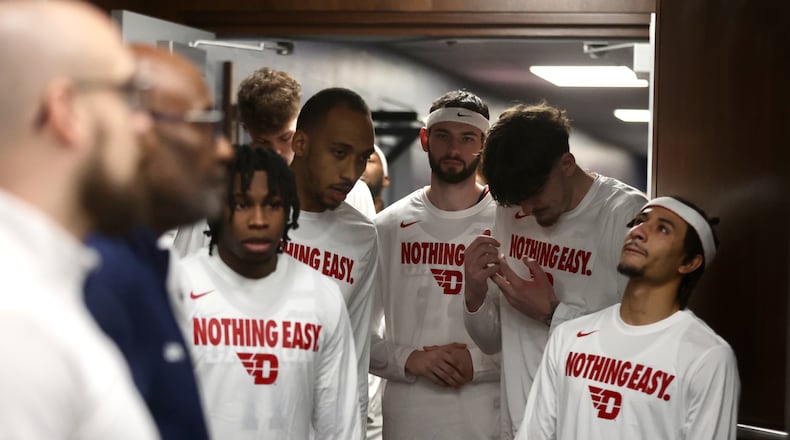 Dayton players wait to take the court before a game against Saint Joseph’s on Friday, March 14, 2025, in the quarterfinals of the Atlantic 10 Conference tournament at Capital One Arena in Washington, D.C. David Jablonski/Staff