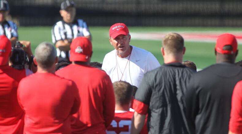 Ohio State’s Urban Meyer talks to the players during practice on Saturday, Aug. 5, 2017, at the Woody Hayes Athletic Center in Columbus. David Jablonski/Staff