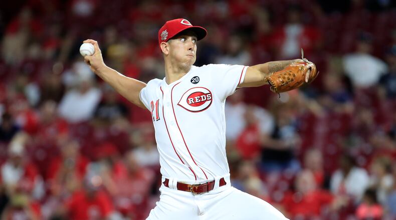 CINCINNATI, OHIO - SEPTEMBER 04: Michael Lorenzen #21 of the Cincinnati Reds throws a pitch against the Philadelphia Phillies at Great American Ball Park on September 04, 2019 in Cincinnati, Ohio. (Photo by Andy Lyons/Getty Images)