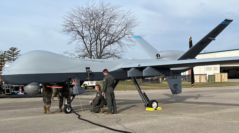 Airmen fuel up an MQ-9 Reaper at Springfield-Beckley Air National Guard Base, Wednesday, March 19, 2025. THOMAS GNAU/STAFF