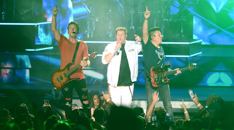 NASHVILLE, TENNESSEE - JULY 06: Joe Don Rooney, Gary LeVox and Jay DeMarcus of the band Rascal Flatts perform at Ascend Amphitheater on July 06, 2019 in Nashville, Tennessee. (Photo by Jason Kempin/Getty Images)