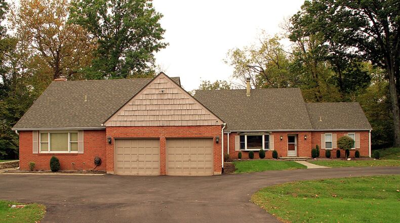 The brick-and-cedar home has about 5,540 sq. ft. of living space on the 3 levels. The house sits on 5.4 acres with three-lined creek. CONTRIBUTED PHOTOS BY KATHY TYLER
