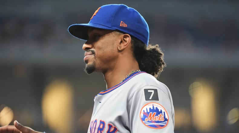 FILE - New York Mets' Francisco Lindor walks to the dugout during a baseball game against the Miami Marlins, Saturday, Sept. 27, 2025, in Miami. (AP Photo/Lynne Sladk,File)