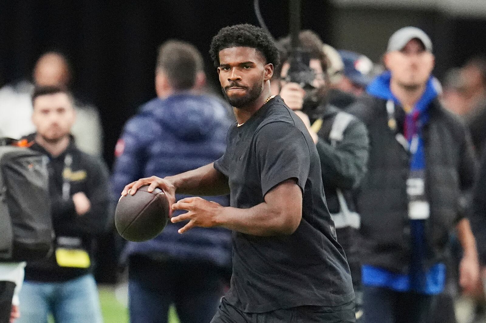Colorado quarterback Shedeur Sanders takes part in passing drills during Colorado's NFL football pro day Friday, April 4, 2025, in Boulder, Colo. (AP Photo/David Zalubowski)