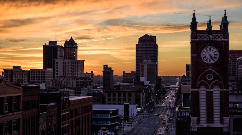 Downtown Dayton at sunset. TOM GILLIAM / STAFF