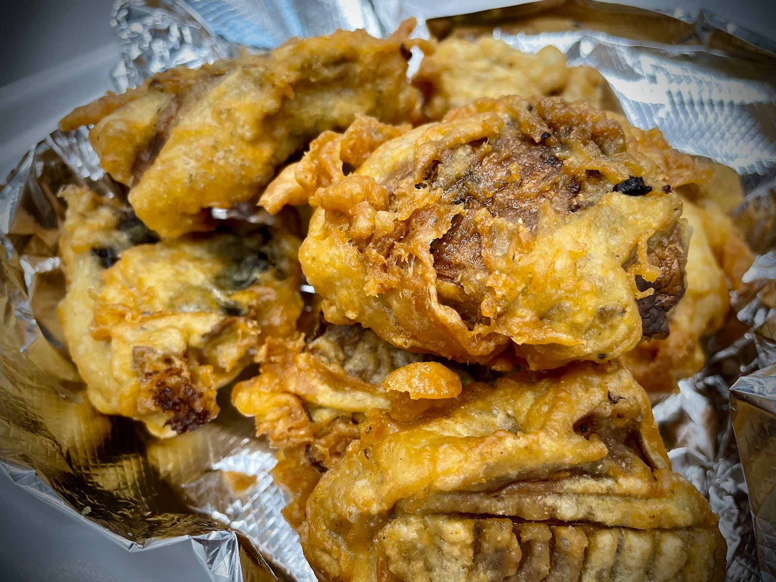 Sourmugs Wings & BBQ is one of six vendors inside The Social at Piqua Center. NATALIE JONES/STAFF