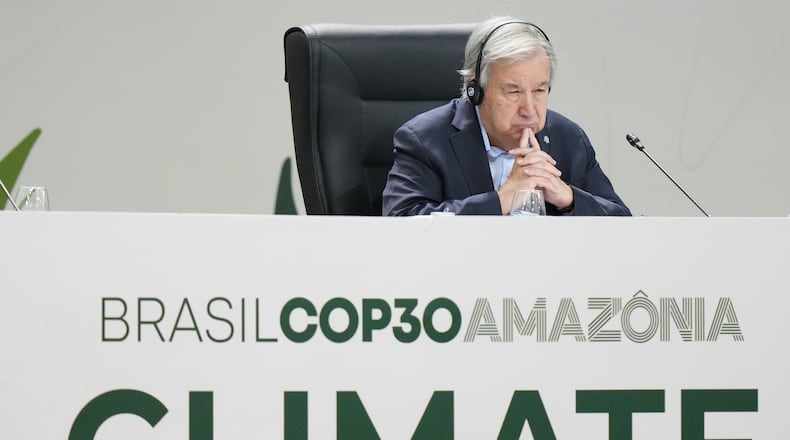 United Nations Secretary-General Antonio Guterres listens to Brazilian President Luiz Inacio Lula da Silva's speech at the COP30 U.N. Climate Summit in Belem, Brazil, Thursday, Nov. 6, 2025. (AP Photo/Fernando Llano)