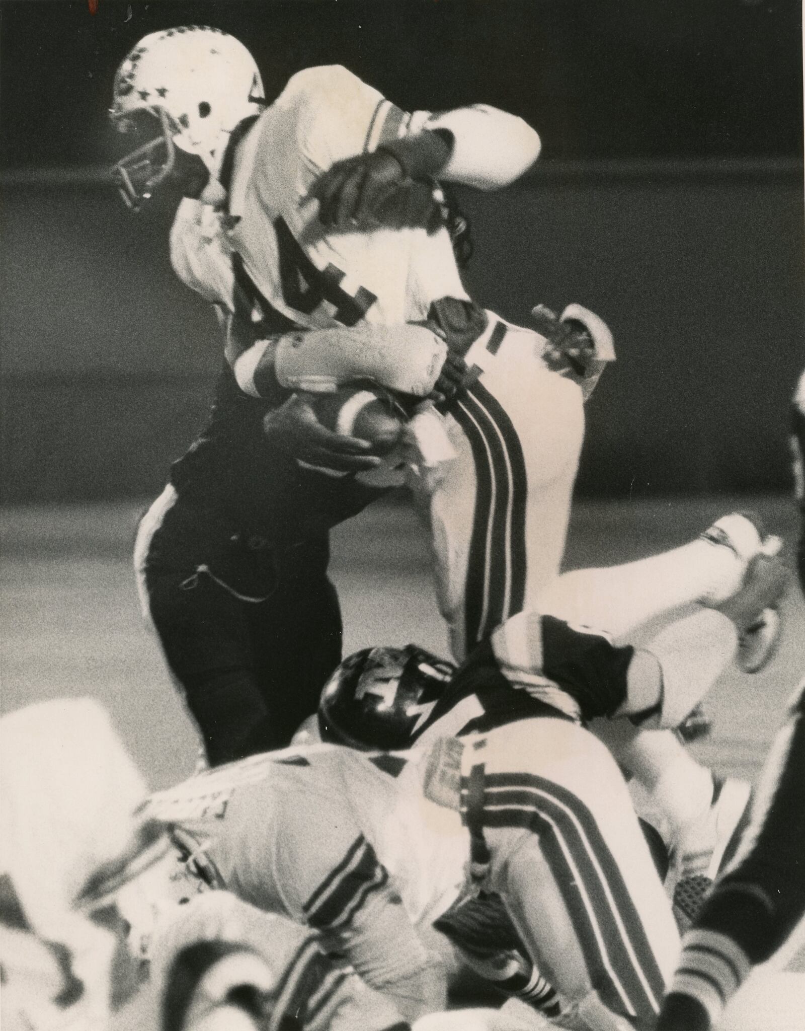 Roth High School running back Keith Byars is stopped by a Meadowdale defender on Oct. 10. 1981 at Welcome Stadium. Byars went on to stardom at Ohio State and a 13-year NFL career. Photo courtesy of DDN Collection at Wright State University Special Collections & Archives