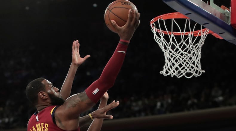 Cleveland Cavaliers forward LeBron James (23) puts up a shot against the New York Knicks during the second quarter of an NBA basketball game, Monday, April 9, 2018, in New York. The Cavaliers won 123-109. (AP Photo/Julie Jacobson)