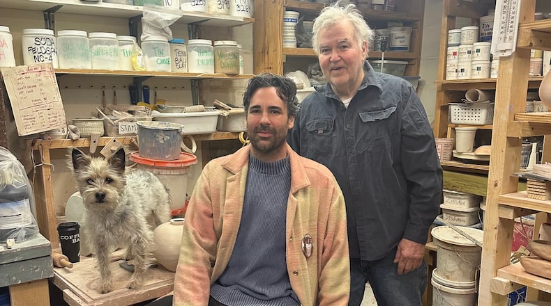 Zachary Armstrong surprised his father, George, with an exhibit of his works. CONTRIBUTED