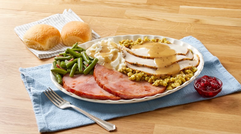 Turkey & Dressing, Cranberry Relish, Ham, Mashed Potatoes & Gravy, Green Beans, Dinner Rolls, 3/4 Angle, 2 Sides