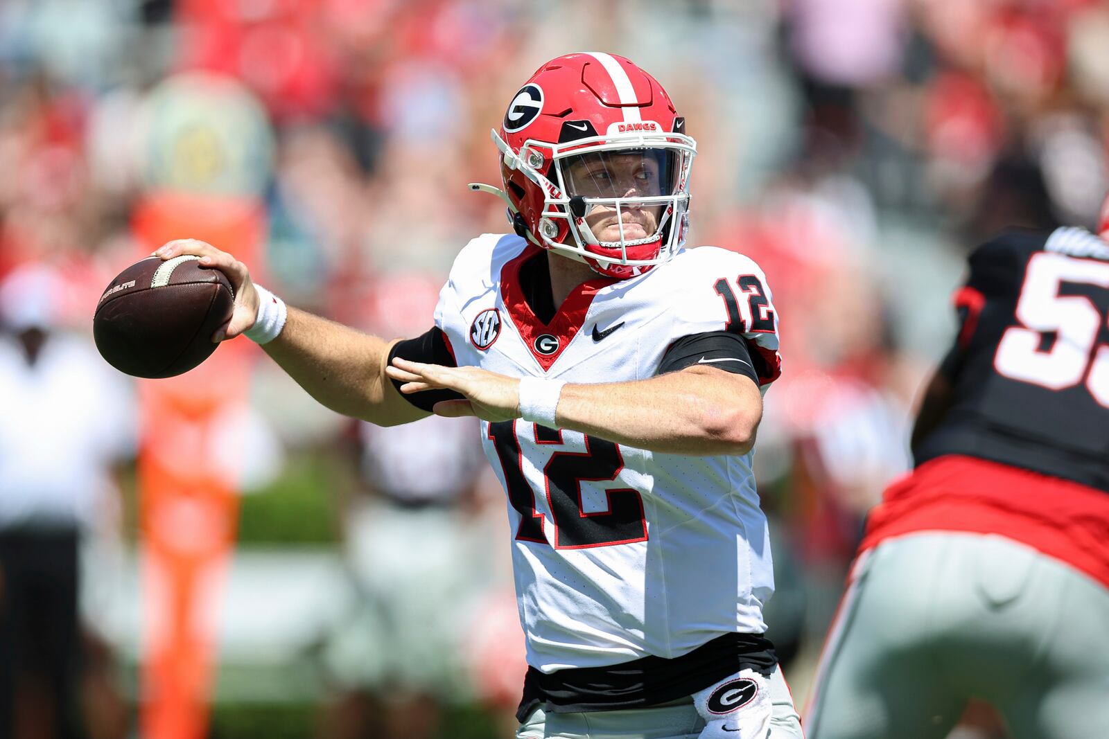 Georgia Black Team quarterback Ryan Puglisi (12) looks to throw a pass during the team's NCAA college football spring game, Saturday, April 12, 2025, in Athens, Ga. (AP Photo/Colin Hubbard)