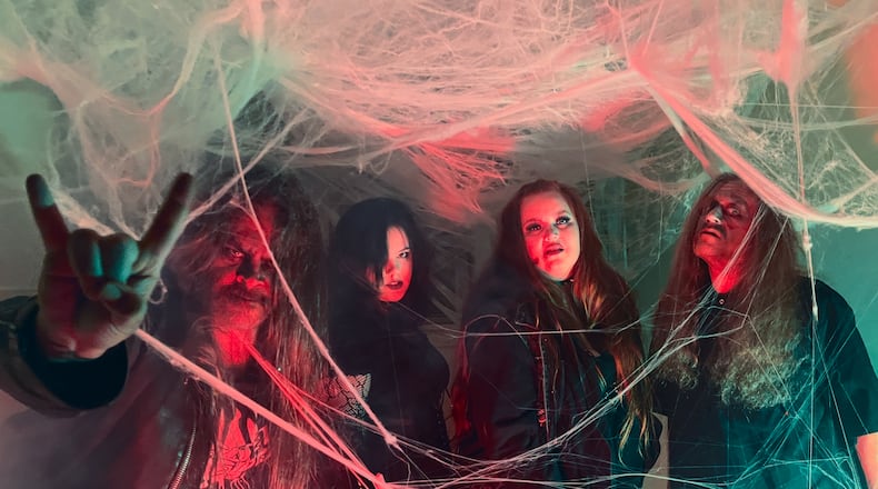 Dayton-based horror punk outfit the Creepy Crawlers, (left to right) Rev. Chad Wells, P.J. Wells, Scarika Watson and Danny Grim, makes its live debut at the 8th annual Halloween Phreakout at American Legion Post 43 in Troy on Saturday, Oct. 21. Cory Ryherd, who joined in late September, is not pictured.