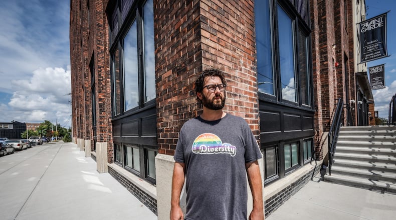 Jeff Graley is the president of Mile Two, a  defense contractor and software company that chose to bring his company to the Manhattan building in downtown Dayton. JIM NOELKER/STAFF