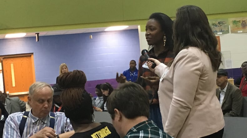 Parents and residents asked questions about Dayton Public Schools’ turnaround plan at a recent town hall meeting.