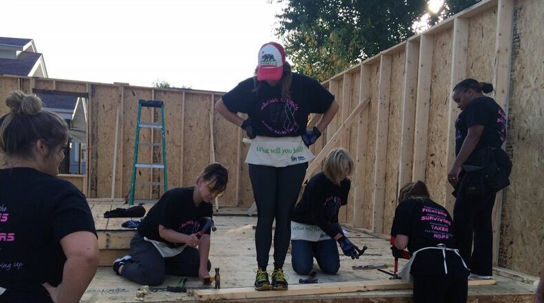 The sales team from the Holiday Inn/Fairborn work together to construct floors and walls in the Habitat for Humanity home in Fairborn. From left: Kaitlyn Farmer, Laura Rozen, Susan Jacobsen, Dianna Cordle, Kalyn Leeper, Kim Peterson. CONTRIBUTED