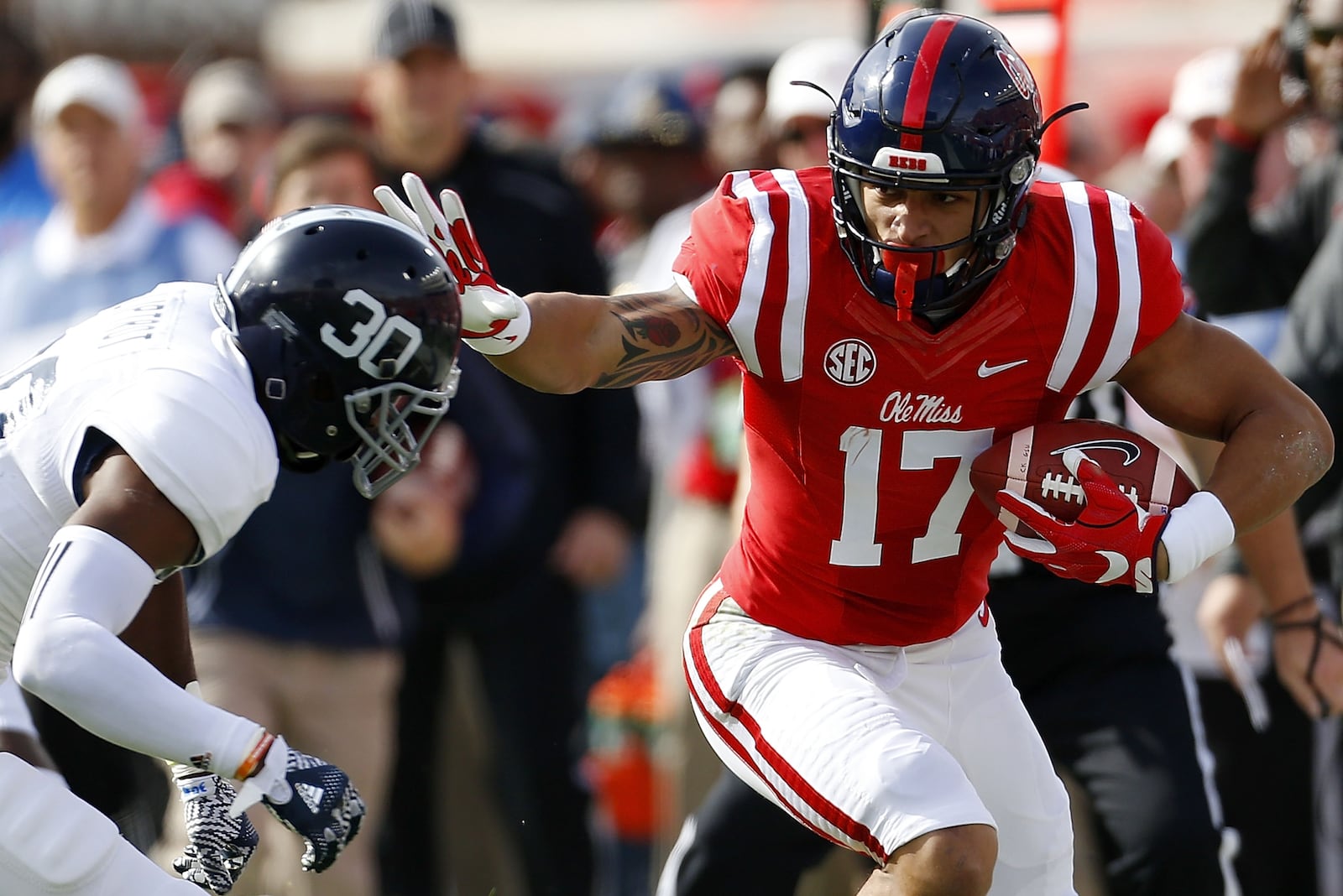 OXFORD, MS - NOVEMBER 05: Evan Engram #17 of the Mississippi Rebels runs with the ball as Jessie Liptrot #30 of the Georgia Southern Eagles defends during the first half of a game at Vaught-Hemingway Stadium on November 5, 2016 in Oxford, Mississippi. (Photo by Jonathan Bachman/Getty Images)