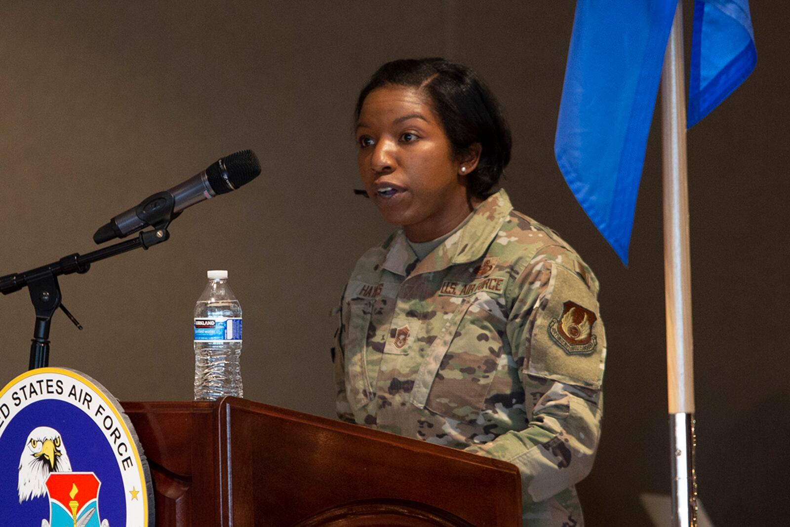 Chief Master Sgt. Sharma Haynes, 88th Comptroller Squadron, gives the keynote address to Airman Leadership School Class 22-A during its graduation ceremony Dec. 2 at Wright-Patterson Air Force Base. Haynes was the class mentor. U.S. AIR FORCE PHOTO/JAIMA FOGG