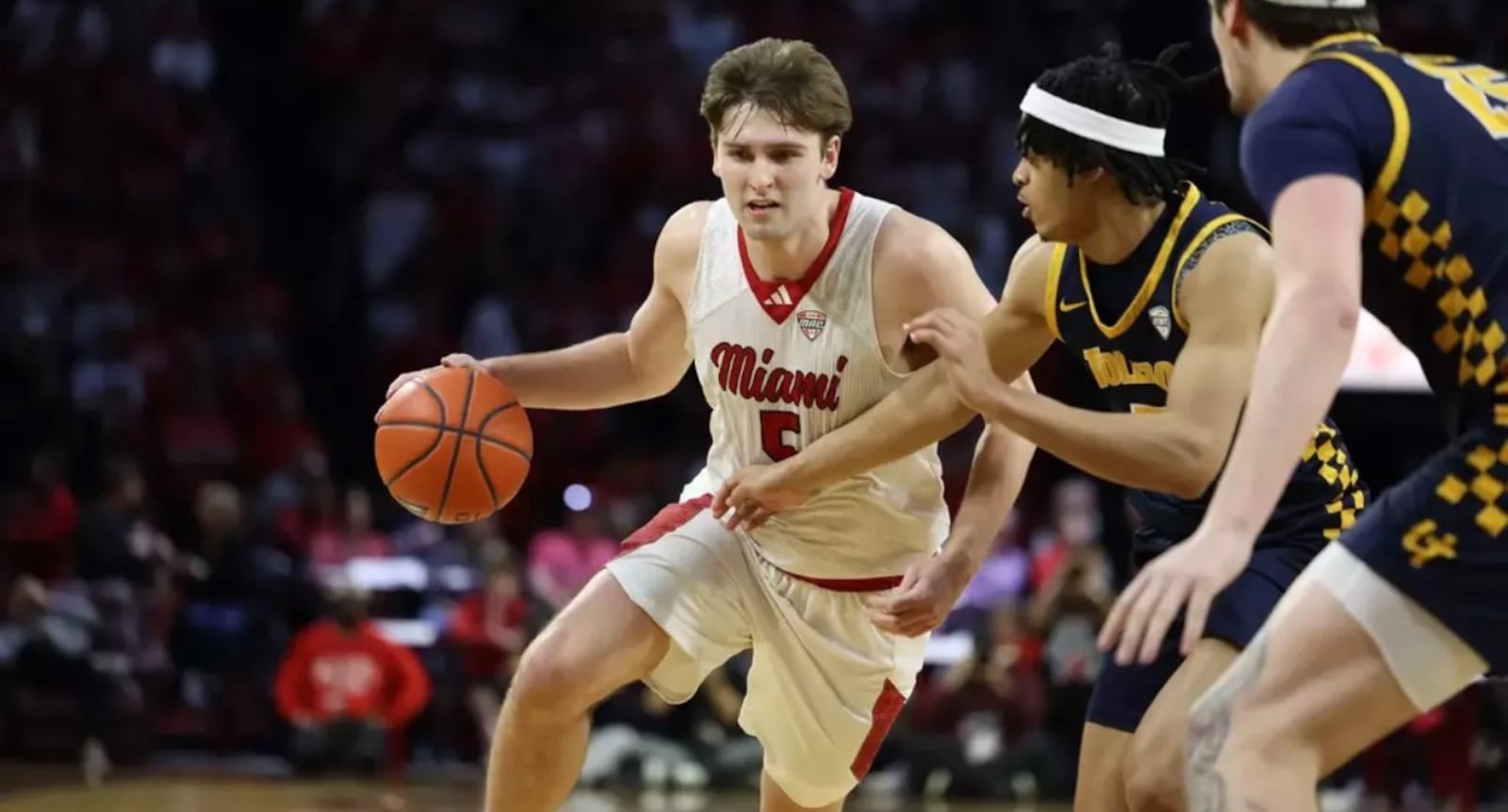 Miami's Peter Suder dribbles the ball during his Mid-American Conference game against Toledo on Tuesday night at Millett Hall. JEFFREY SABO / MIAMI ATHLETICS