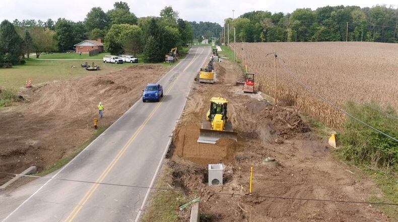 Shakertown Road in Beavercreek was closed for two weeks in October between Burntwood Drive and Grange Hall Road for a culvert replacement. The work was part of a $1.2 million road widening project that is expected to be completed in May, 2019. The widening adds a turn lane to the middle of the road, curbs and sidewalks. TY GREENLEES / STAFF