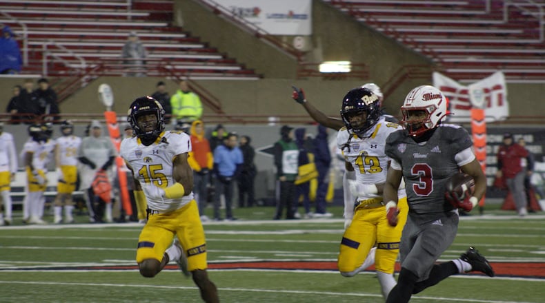 Miami running back Keyon Mozee breaks off a long rushing touchdown against Kent State University on Nov. 13. Kasey Turman/CONTRIBUTED
