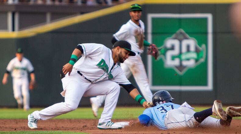 Dragons second baseman Francisco Urbaez tags out Lake County's Quentin Holmes to end the third inning Wednesday night at Day Air Ballpark. Holmes was thrown out trying to steal second by Dragons catcher James Free. Jeff Gilbert/CONTRIBUTED
