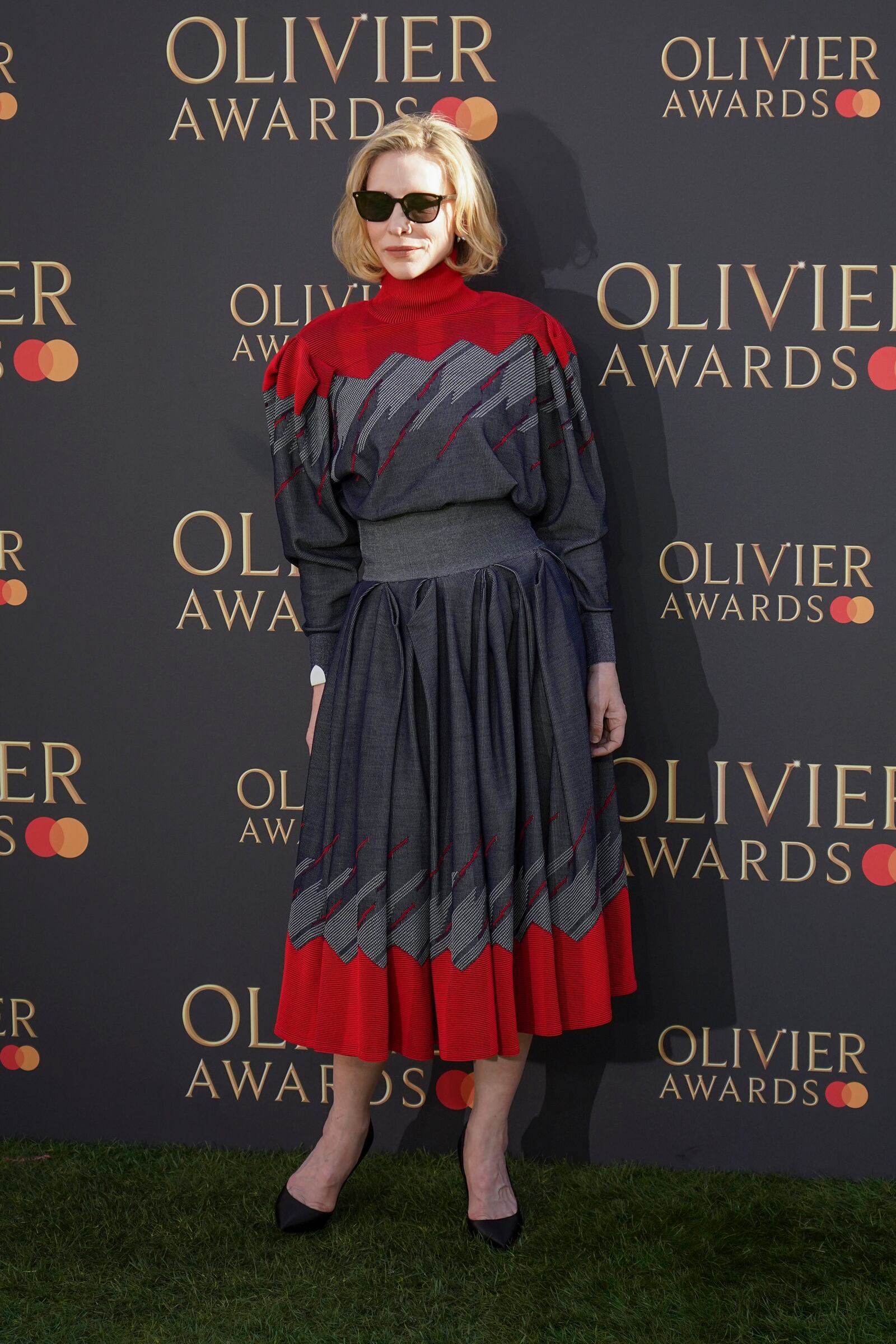 Cate Blanchett poses for photographers upon arrival at the Olivier Awards on Sunday, April 6, 2025, in London. (Photo by Alberto Pezzali/Invision/AP)