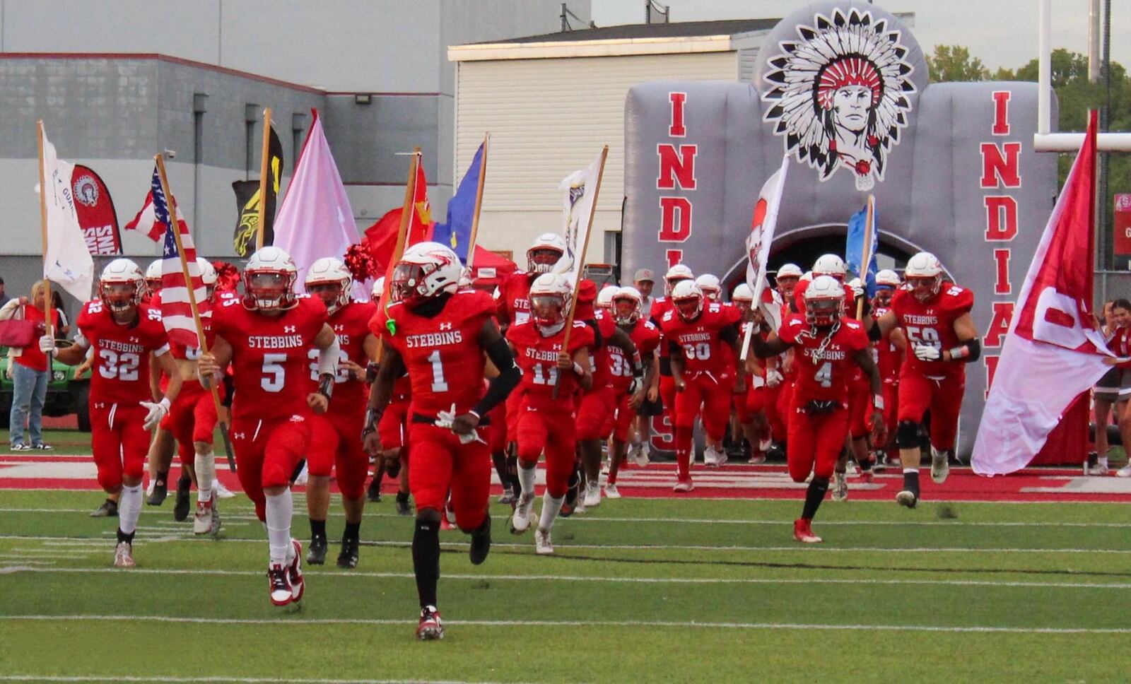 The Stebbins High football team takes the field before a game earlier this season. Ebonie Sherwood/CONTRIBUTED