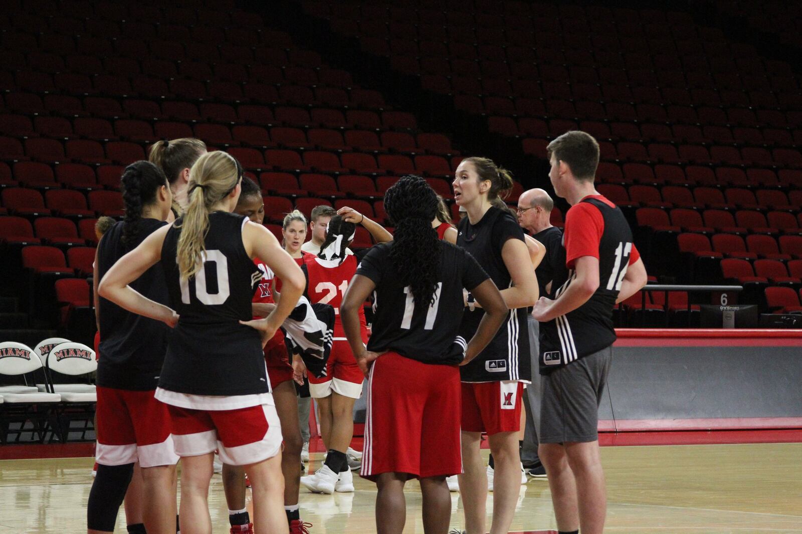 Former Dayton standout Justine Raterman, now an assistant coach for the Miami women’s basketball team, instructs players during a practice this week. Maria Slovikovski/Miami University