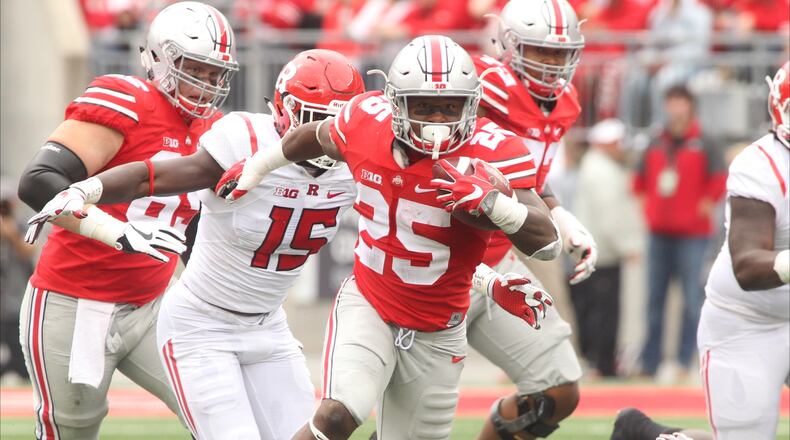 Ohio State's Mike Weber runs for 49 yards against Rutgers on Saturday, Oct. 1, 2016, at Ohio Stadium in Columbus. David Jablonski/Staff