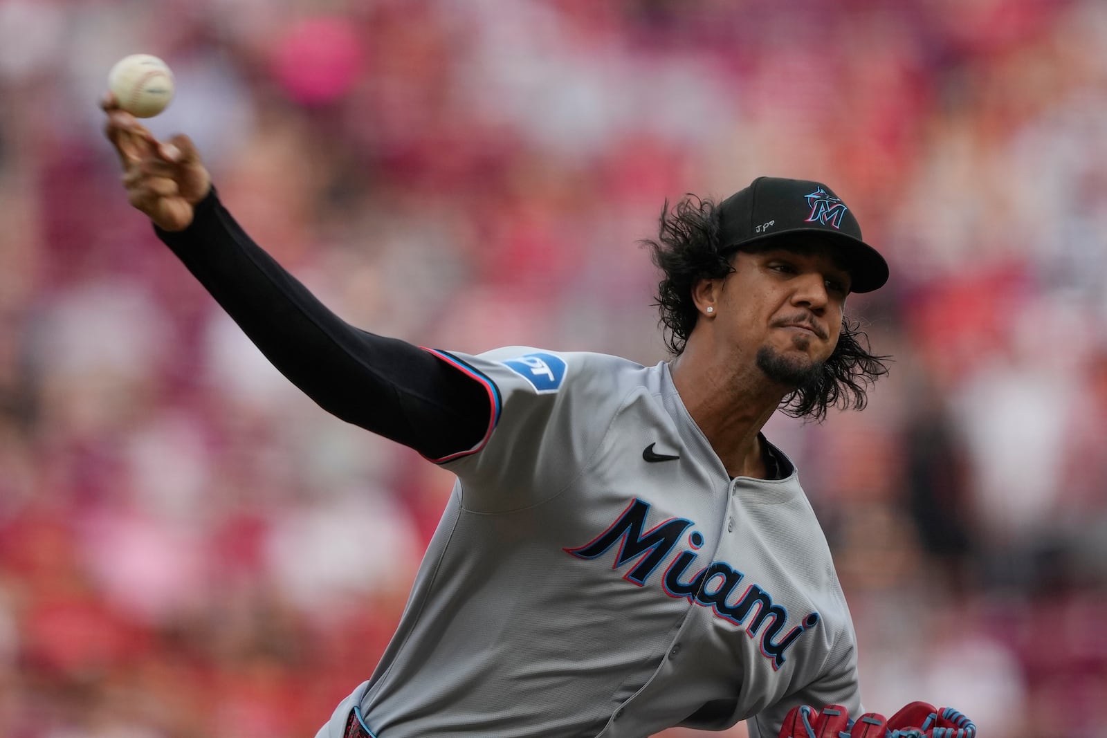 Miami Marlins pitcher Eury Pérez throws during the first inning of a baseball game against the Cincinnati Reds in Cincinnati, Tuesday, July 8, 2025. (AP Photo/Carolyn Kaster)