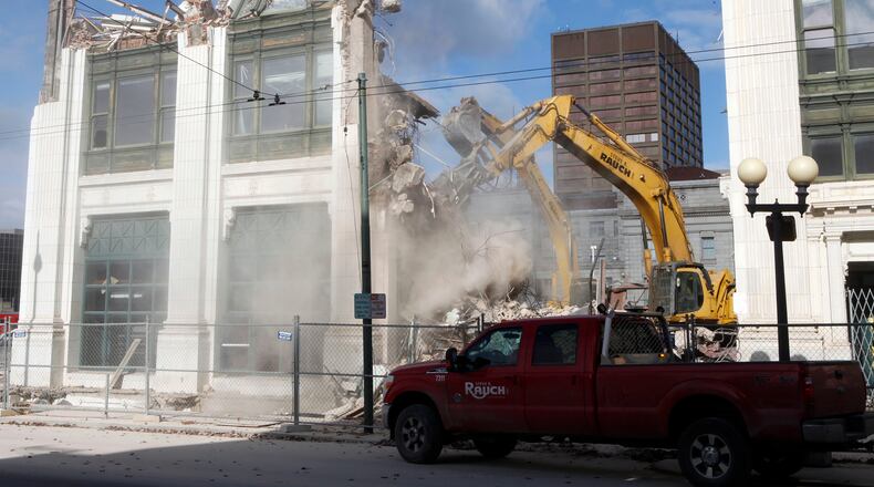 Demolition of the old Dayton Daily News building continued on Wednesday, November 27. The 1922 portion of the building is being demolished and the 1908 main building will remain as a 200 unit student housing facility will be constructed on the site on Fourth St. between Ludlow and Wilkinson Streets. RELATED:Video of the demolition | Article: Preservationists question demolition of DDN building facade | Photos: Implosion of Schwind building next door